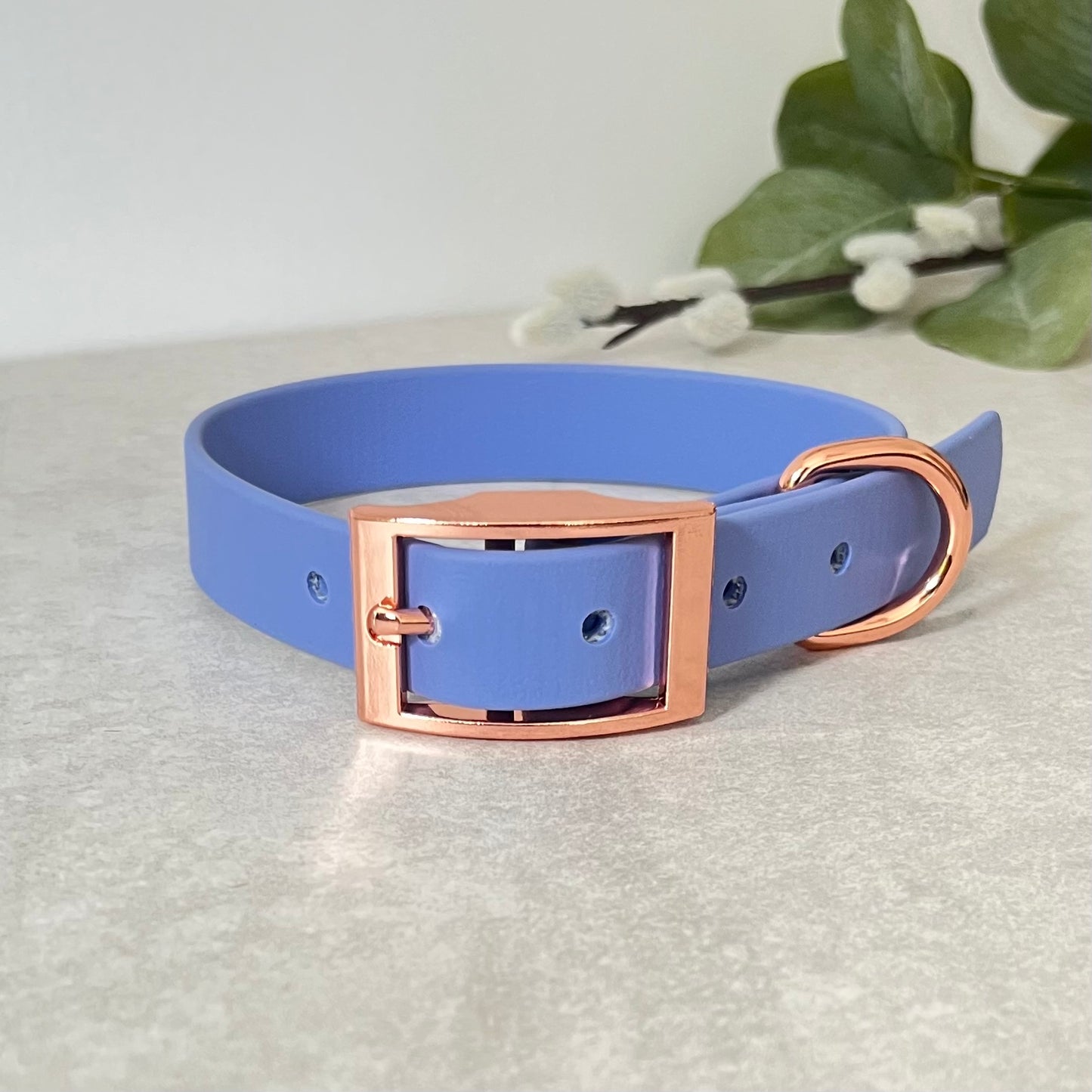 Biothane custom collar in Periwinkle with Rose Gold buckle and aD-ring. The collar has 5 holes which are spaced 2cm apart. Soft leather appearance