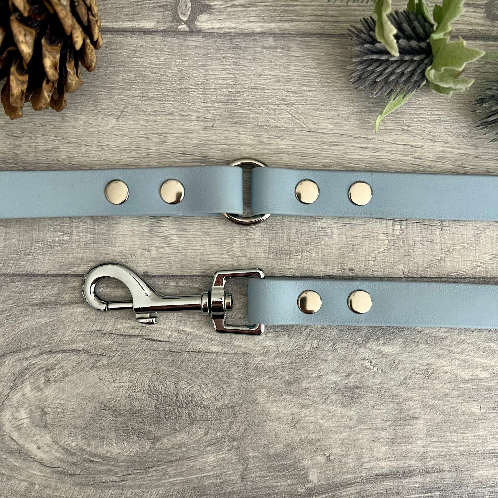 Pastel Blue BioThane dog lead with Silver hardware. The lead and handle are joined by an O-ring, each end is fixed with two rivets.