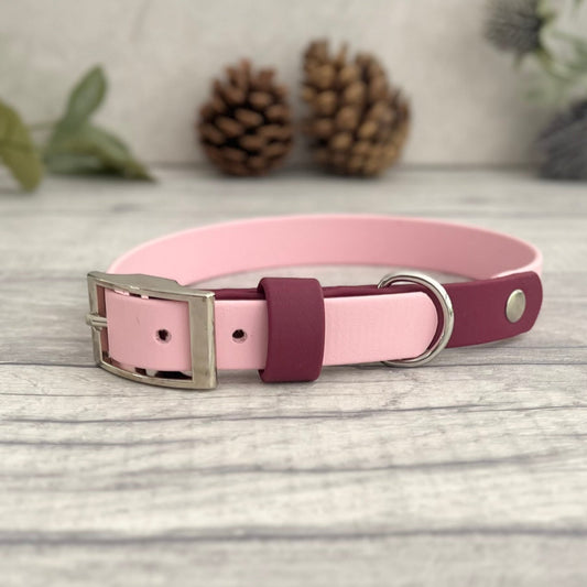 Two tone dog collar in Light Pink & Wine Red . The collar strap is two colours fixed together with a rivet. The collar has a Biothane strap keeper and a metal D-ring with 5 x punched holes. All hardware is Silver