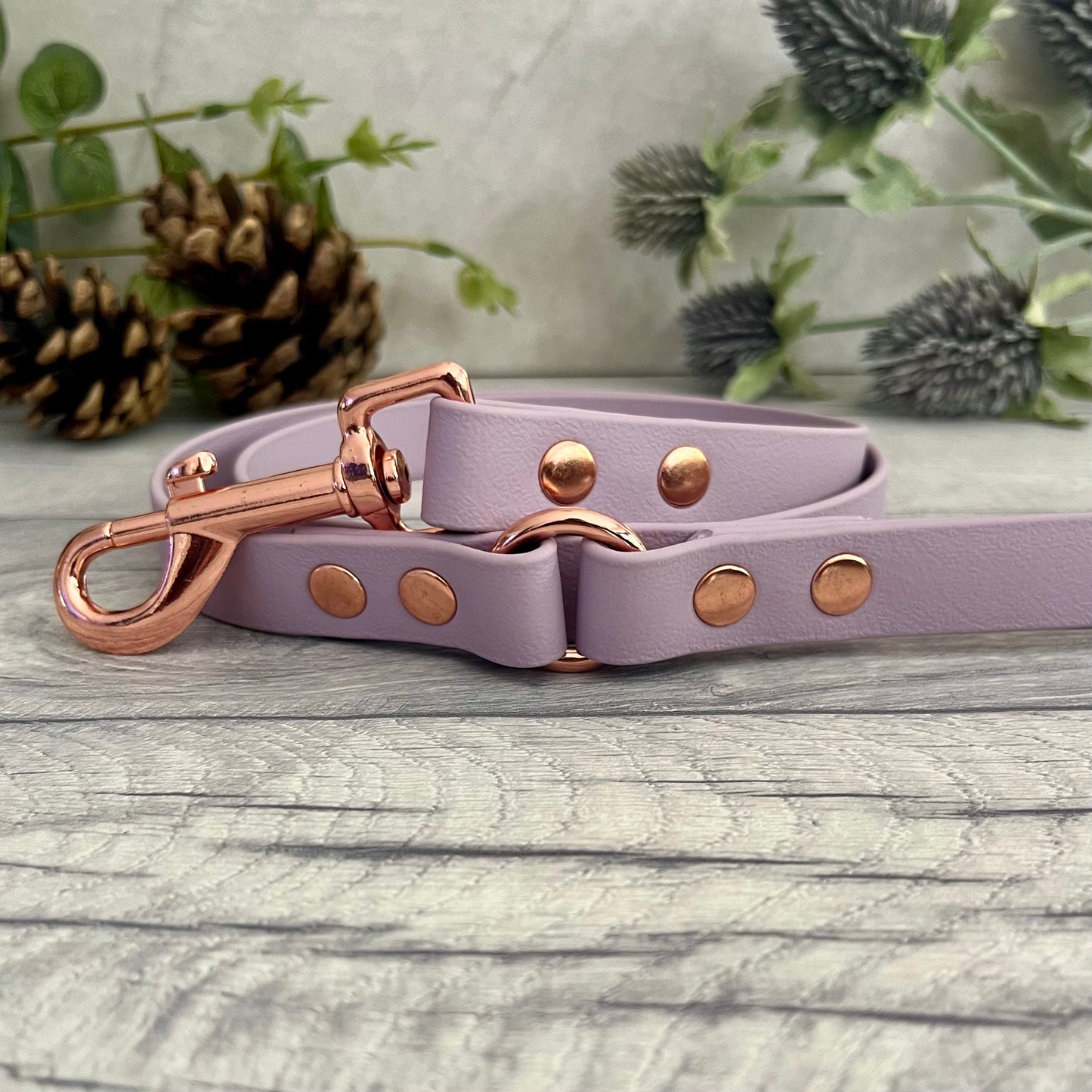 Lavender BioThane dog lead with Rose Gold hardware. The lead and handle are joined by an O-ring, each end is fixed with two rivets.