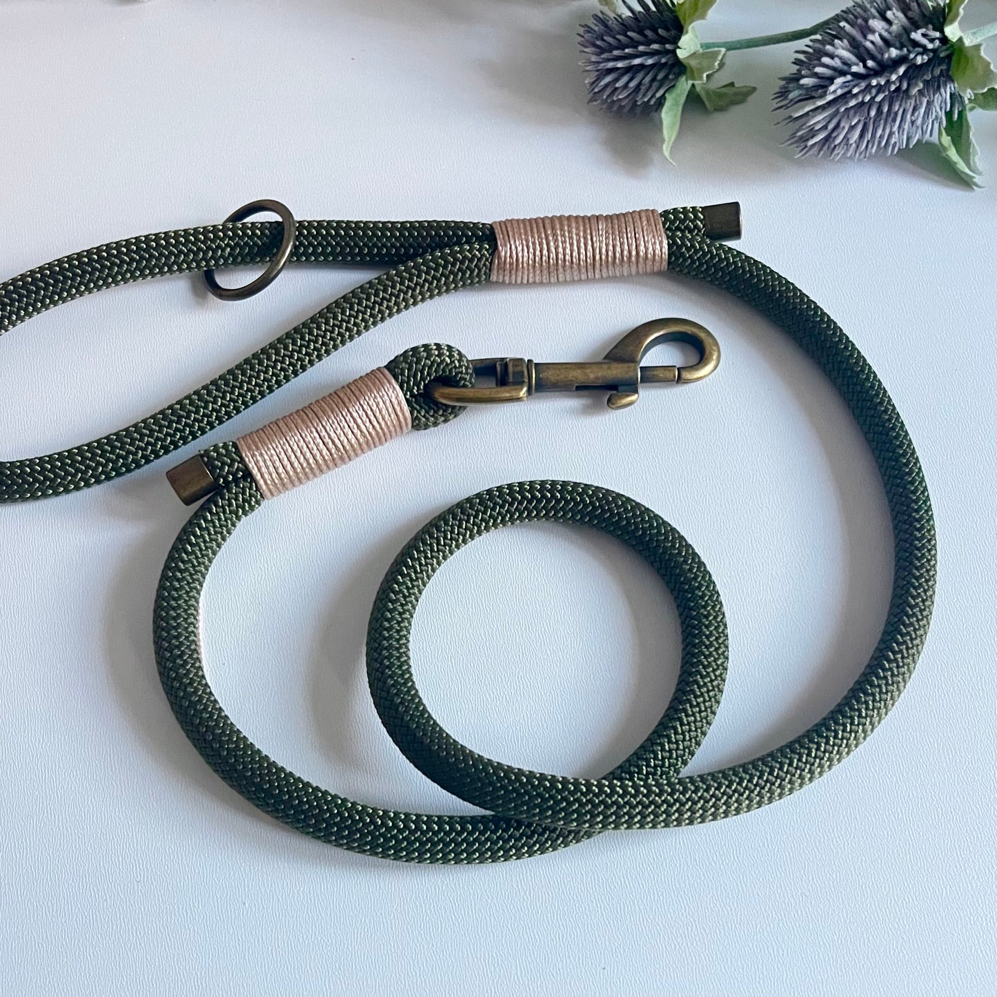 Olive green rope dog lead with antique brass hardware and beige whipping