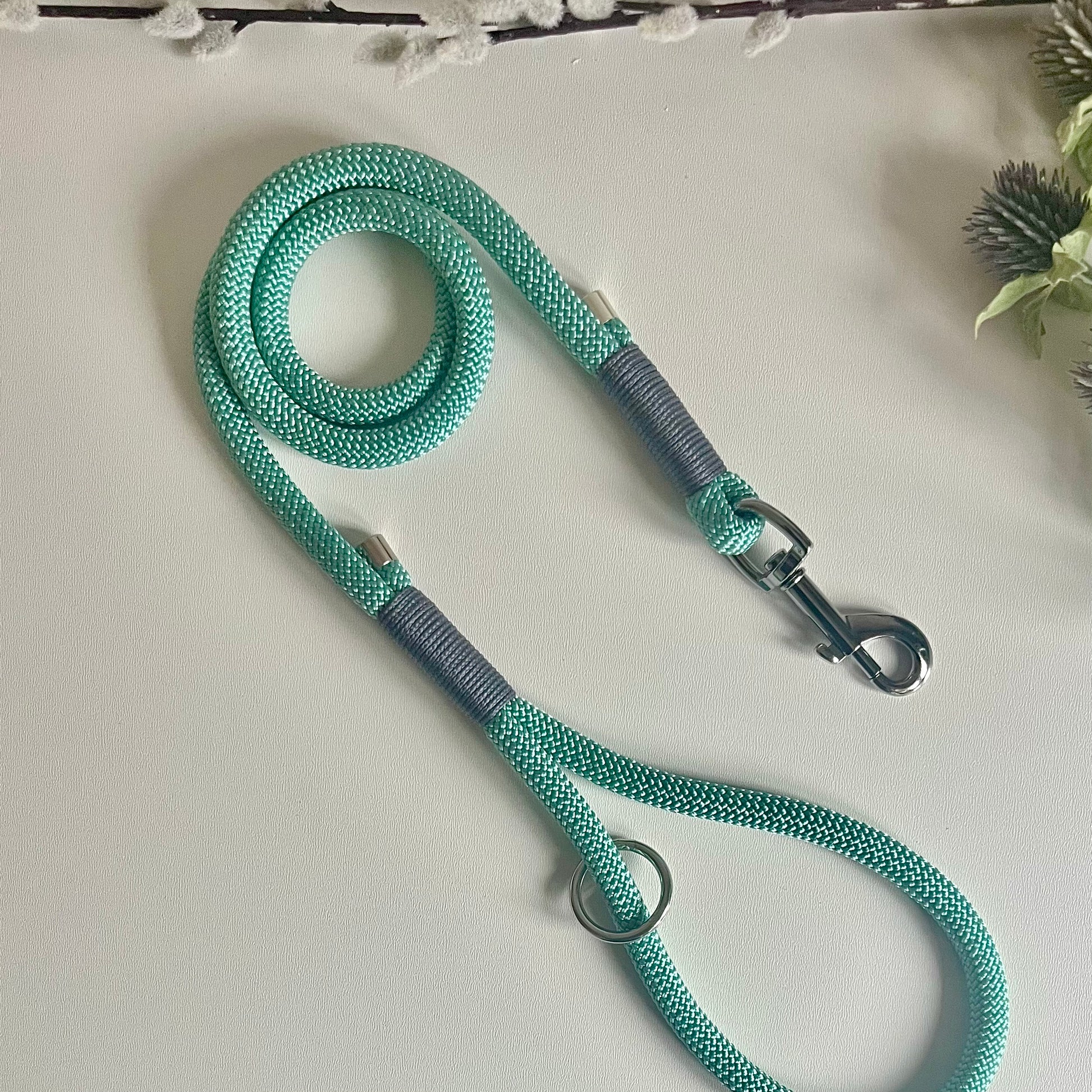 Sea green rope dog lead with silver hardware and charcoal whipping