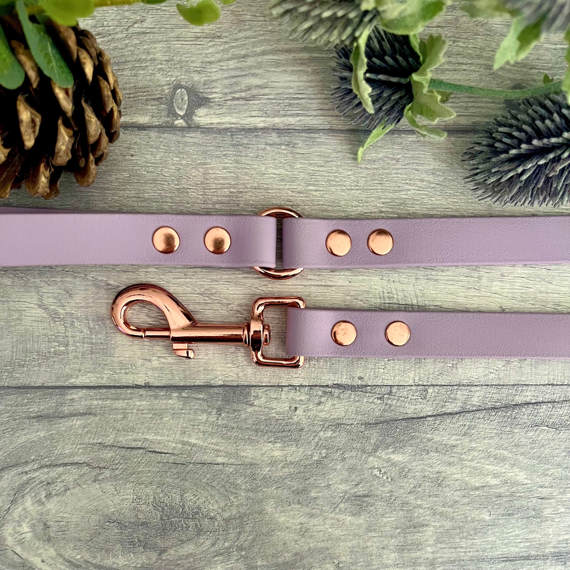 Lavender BioThane dog lead with Rose Gold hardware. The lead and handle are joined by an O-ring, each end is fixed with two rivets.